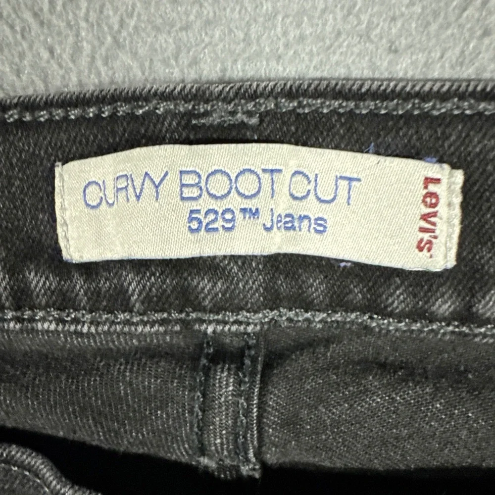 Levis Jeans Women 12 Black 529 Curvy Boot Cut Faded Mid Rise Stretch Denim